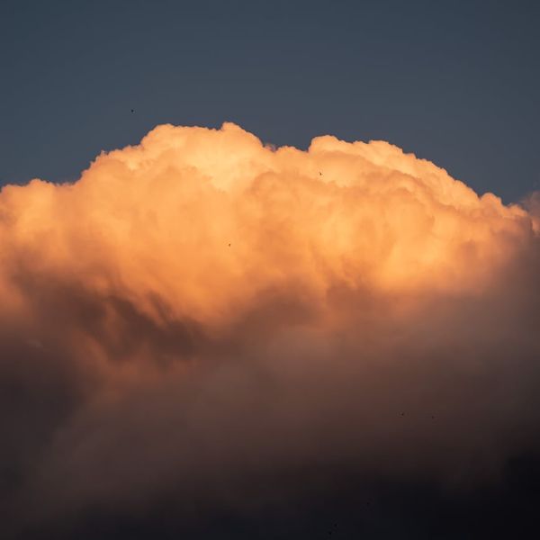 Woman feeling energized and vibrant after a yoga session.
